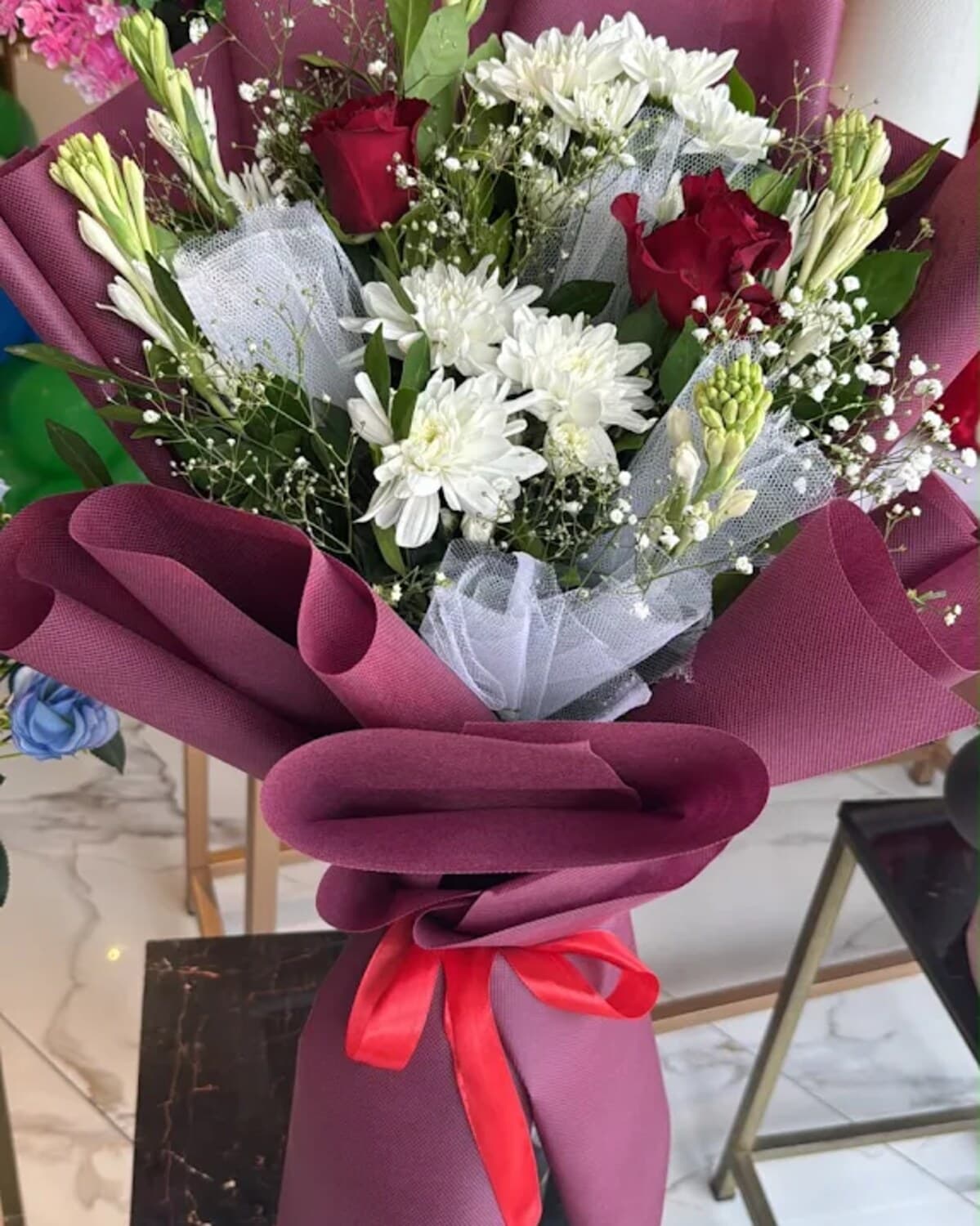 Burgundy Tulle Rose Bouquet fresh flower bouquet by Phool Pattiyan Lahore