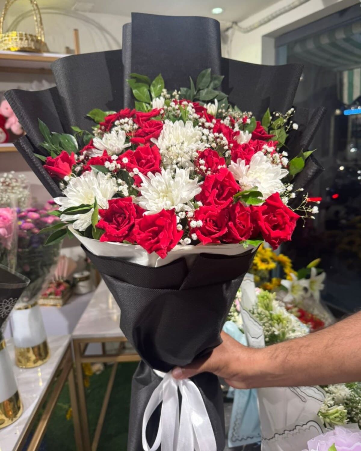 Crimson Ivory Black Fan Bouquet fresh flower bouquet by Phool Pattiyan Lahore